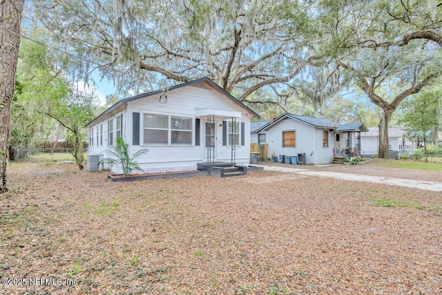 bungalow-style house featuring central AC