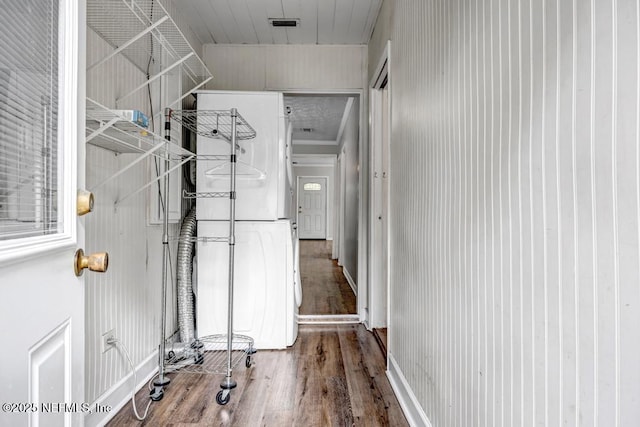 interior space with visible vents and wood finished floors