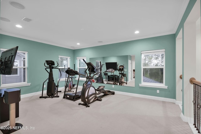 workout area featuring baseboards, recessed lighting, visible vents, and crown molding