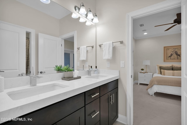 full bath featuring double vanity, a sink, visible vents, and a ceiling fan