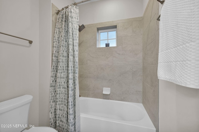 full bathroom featuring toilet and shower / bathtub combination with curtain