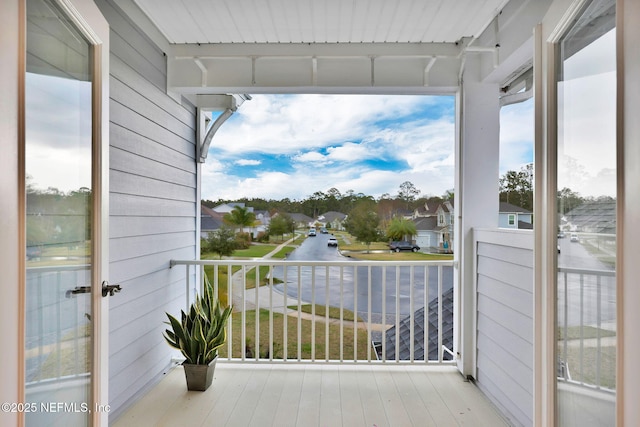 balcony featuring a residential view