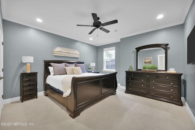 bedroom with ornamental molding, light colored carpet, and baseboards