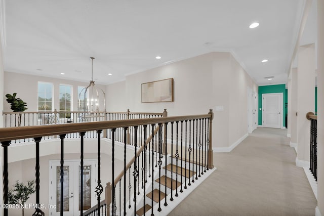 hall with a chandelier, recessed lighting, light carpet, an upstairs landing, and baseboards