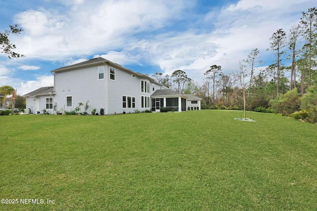 view of yard with a sunroom