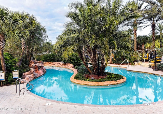 community pool with a patio