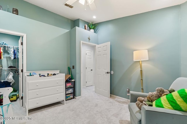 bedroom with visible vents, a ceiling fan, a spacious closet, carpet floors, and a closet