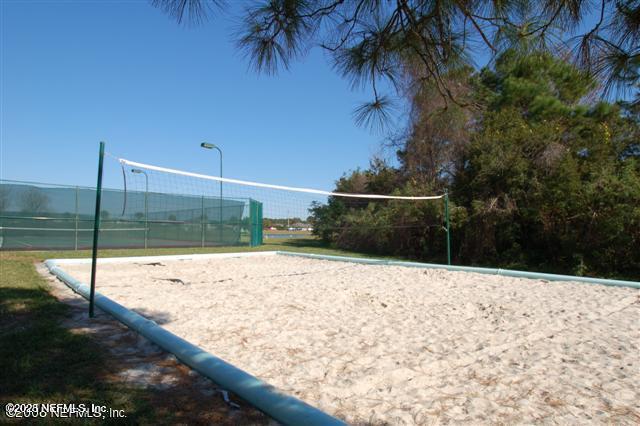 view of home's community with volleyball court