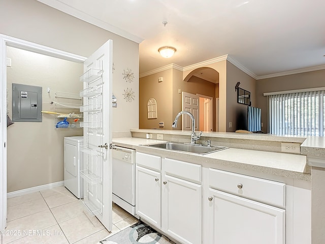 kitchen with light tile patterned floors, electric panel, washing machine and clothes dryer, white dishwasher, and a sink