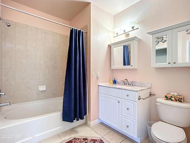 bathroom featuring tile patterned flooring, vanity, toilet, and shower / bath combo with shower curtain