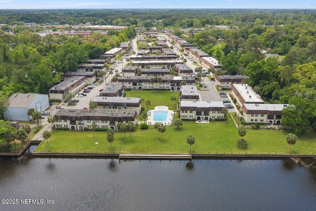 bird's eye view with a residential view and a water view