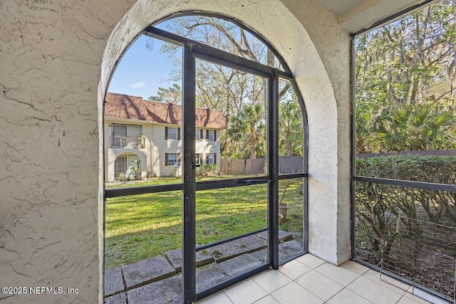 entryway with tile patterned floors