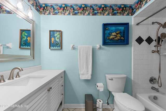 full bathroom featuring bathtub / shower combination, vanity, toilet, and baseboards