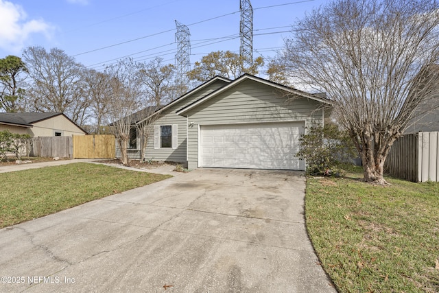 ranch-style house featuring a garage, fence, driveway, and a front lawn