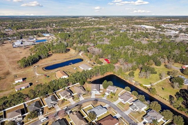 aerial view with a water view and a residential view