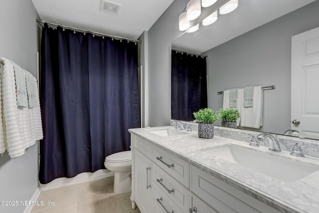 full bath with tile patterned flooring, toilet, visible vents, and a sink