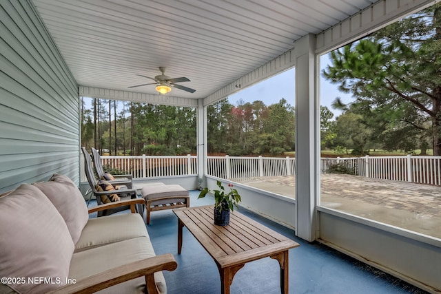 sunroom / solarium with ceiling fan