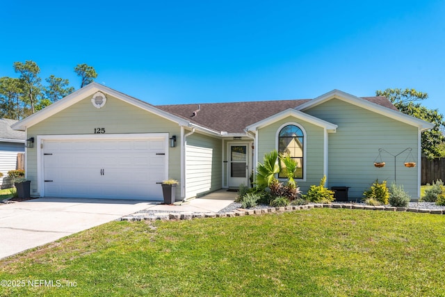 ranch-style home featuring concrete driveway, a shingled roof, an attached garage, and a front yard