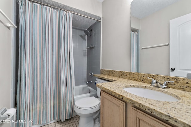 full bath featuring a textured ceiling, shower / bath combo with shower curtain, vanity, and toilet