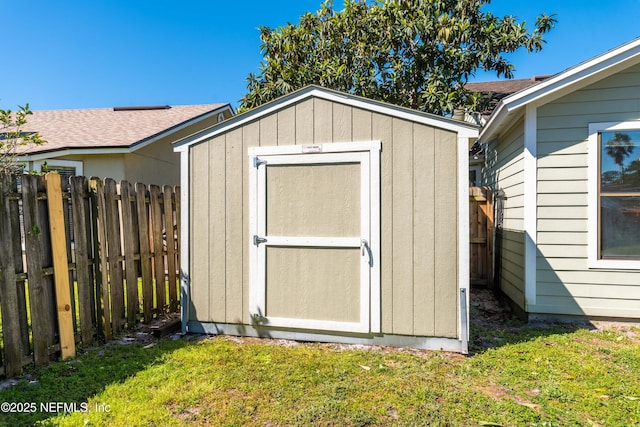 view of shed featuring a fenced backyard