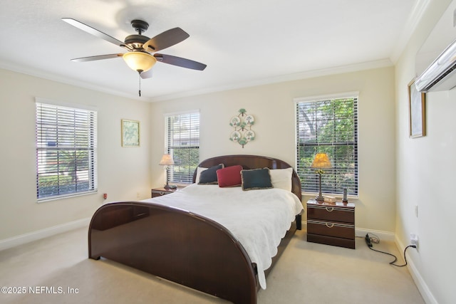 bedroom with a ceiling fan, baseboards, crown molding, and light colored carpet