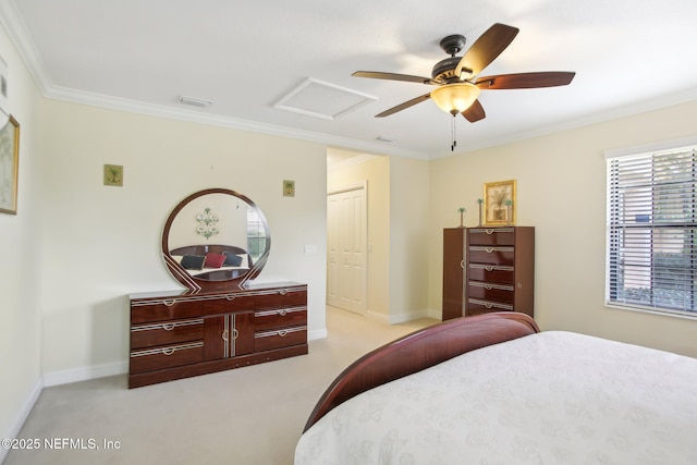 bedroom with light carpet, attic access, and crown molding