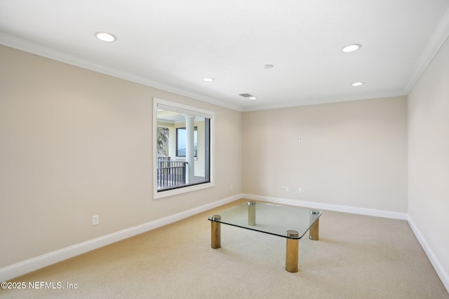 carpeted empty room featuring ornamental molding, recessed lighting, and baseboards