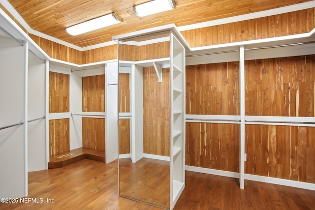 spacious closet with wood finished floors