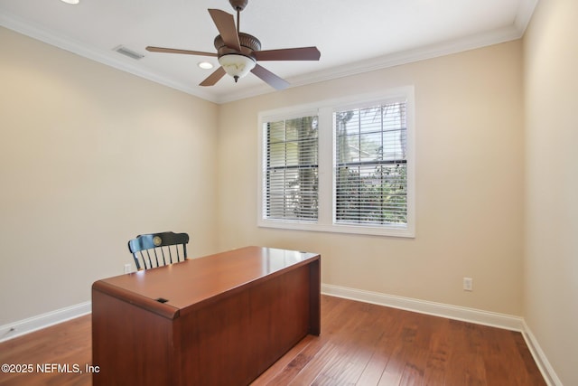 office with baseboards, wood finished floors, visible vents, and a ceiling fan