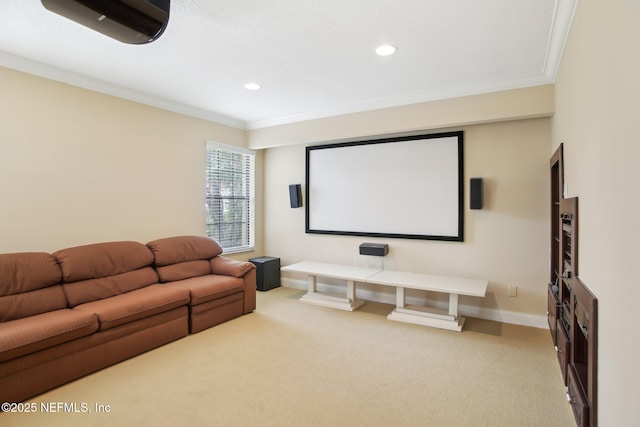 carpeted cinema with ornamental molding, recessed lighting, and baseboards