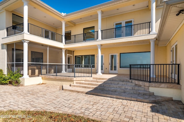 exterior space with stucco siding