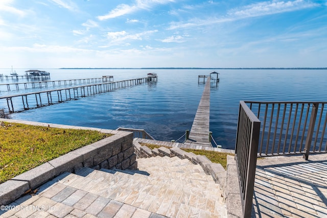 dock area with a water view