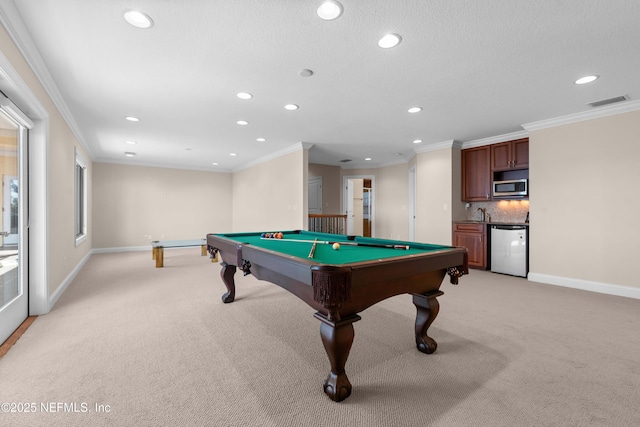 game room with recessed lighting, light carpet, crown molding, and baseboards