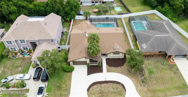 birds eye view of property with a residential view