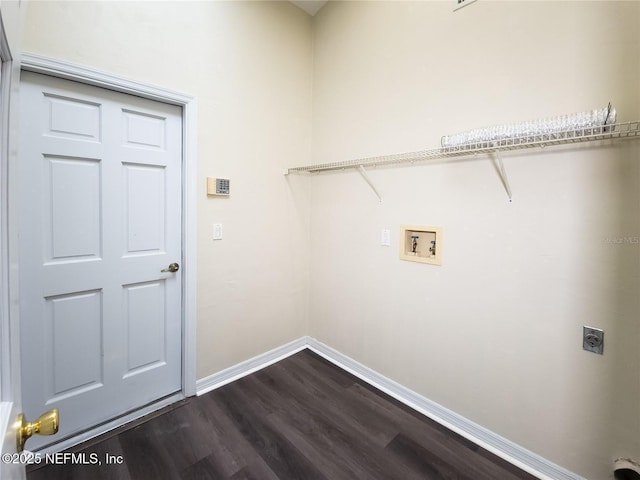 laundry room with washer hookup, dark wood finished floors, electric dryer hookup, laundry area, and baseboards