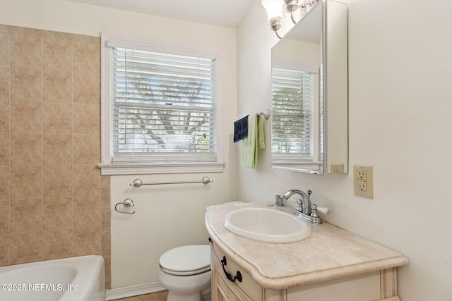 full bath with vanity and toilet