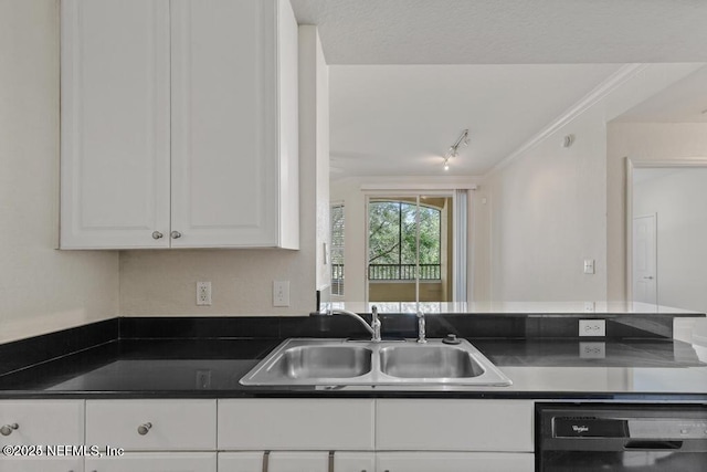 kitchen featuring black dishwasher, dark countertops, ornamental molding, white cabinets, and a sink