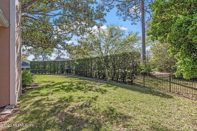 view of yard with fence