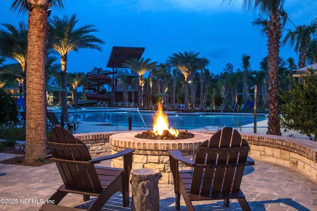 92 Hogan Ct, Saint Augustine, FL 32092 - community pool with a patio area and a fire pit