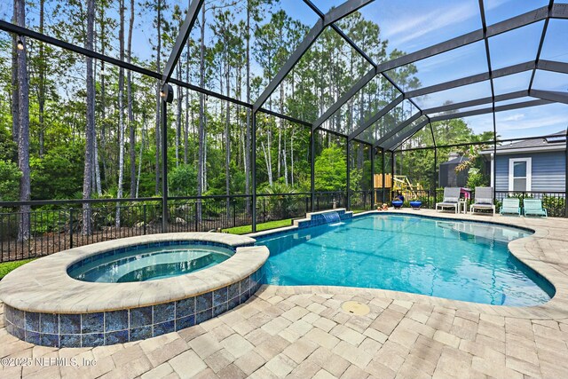 294 Mahi Dr, Ponte Vedra, FL 32081 - view of pool with a patio, a pool with connected hot tub, fence, and glass enclosure