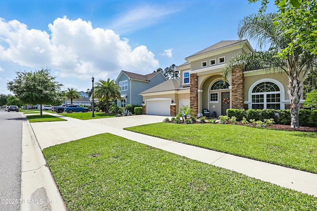 294 Mahi Dr, Ponte Vedra, FL 32081 - mediterranean / spanish home featuring an attached garage, concrete driveway, stucco siding, a front lawn, and a residential view