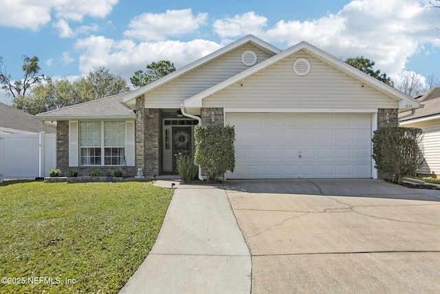 ranch-style house with a garage, driveway, a front lawn, and fence