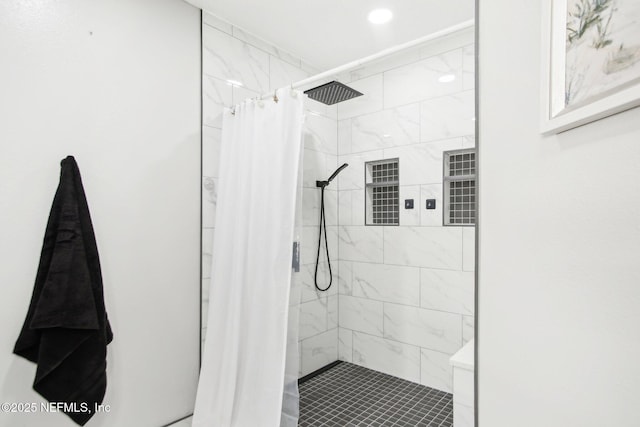 full bath featuring recessed lighting and a stall shower