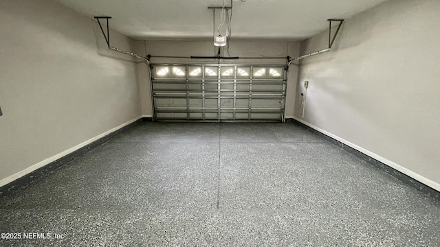 garage with baseboards