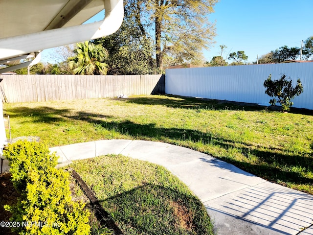 view of yard featuring a fenced backyard