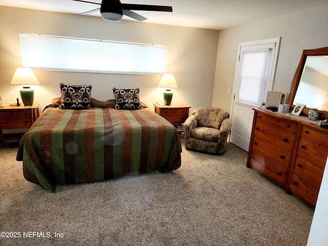 bedroom with carpet floors and a ceiling fan