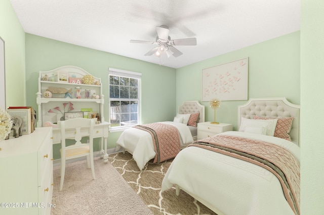 bedroom with carpet and a ceiling fan