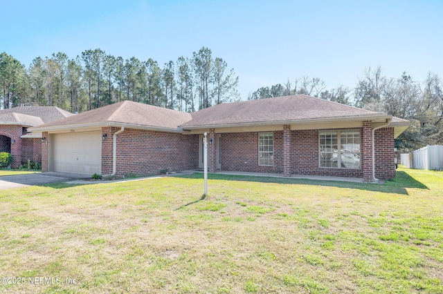 ranch-style house featuring a garage, driveway, brick siding, fence, and a front yard