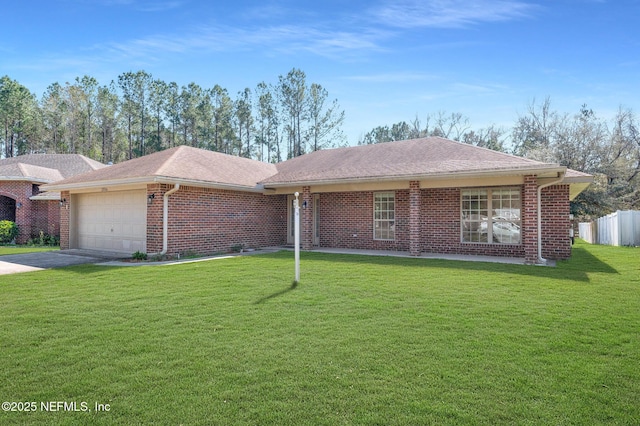 ranch-style house with a garage, driveway, brick siding, fence, and a front yard