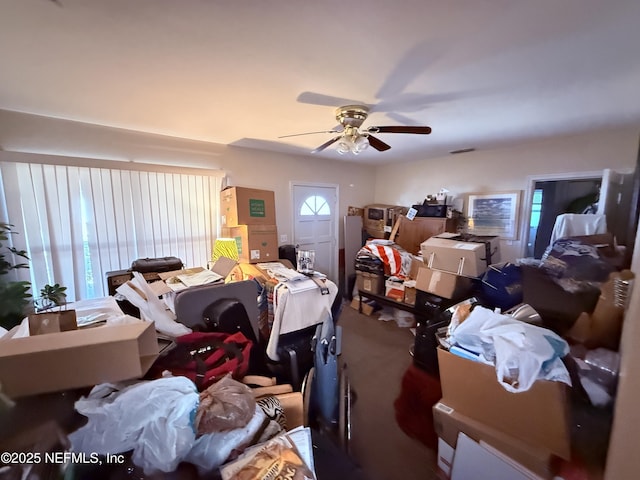 living room featuring a ceiling fan